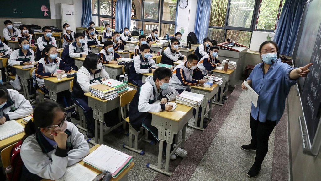 High school students study in a classroom in Wuhan, China, as they returned to school on May 6.STR-AFP via Getty Images.jpg