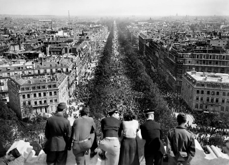 A celebration of Germany's surrender takes place on Paris' Champs Elysees, as seen from the top of the Arc de Triomphe ,on May 8, 1945..jpg