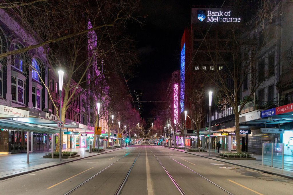An empty Swanston Street is seen in Melbourne's Central Business District on August 5. Australia's second-most populous city has implemented a curfew for the next six weeks.Asanka Brendon Ratnayake-AP.jpg