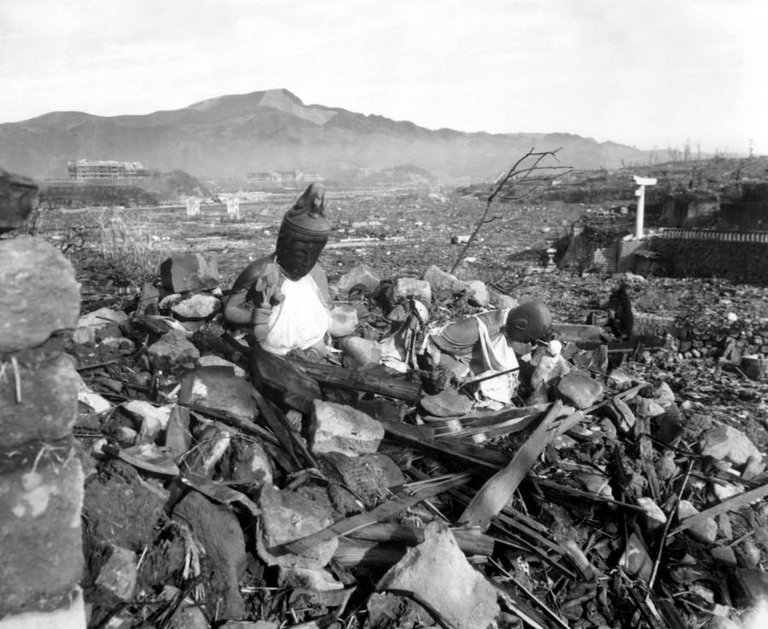 Battered religious figures stand amid the rubble of Nagasaki, Japan on September 24, 1945, six weeks after the U.S. destroyed the city with an atomic bomb..jpg