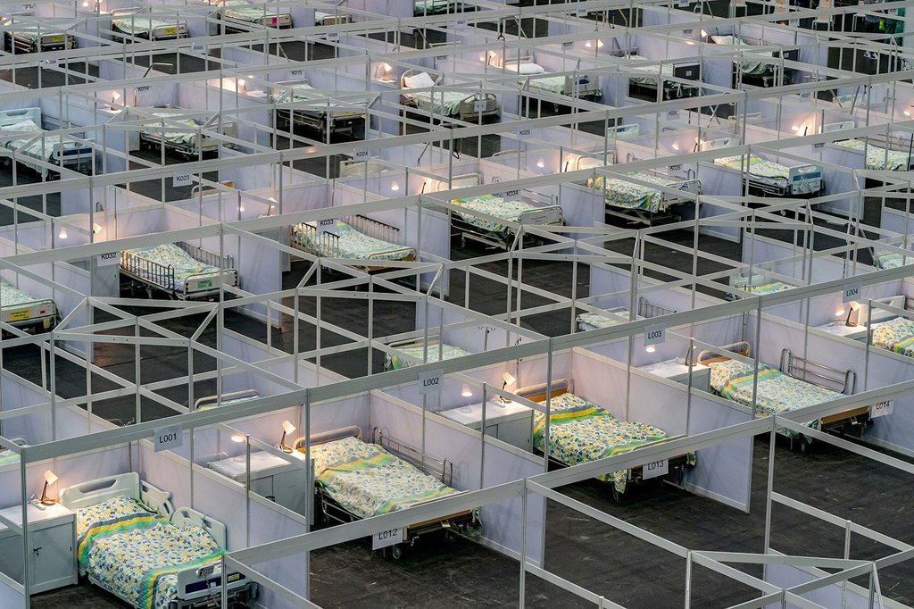 Beds are seen at a temporary field hospital set up in Hong Kong on August 1. AsiaWorld-Expo has been converted into a makeshift hospital that can take up to 500 patients. Anthony Kwan-Getty Images.jpg