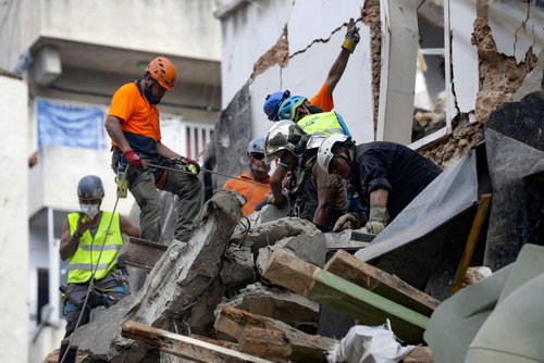 Beirut explosion  - rescuers search for possible survivors.jpg