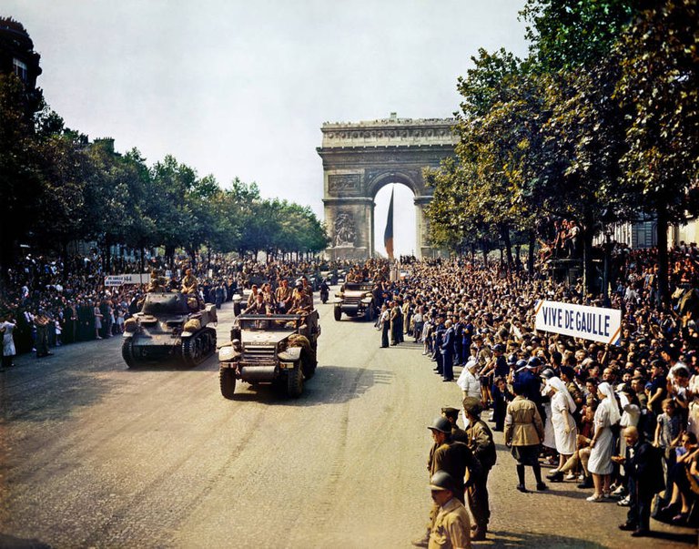 Crowds gather on Paris' Champs Elysees as French tanks roll past in celebration of the liberation of France on August 26, 1944..jpg