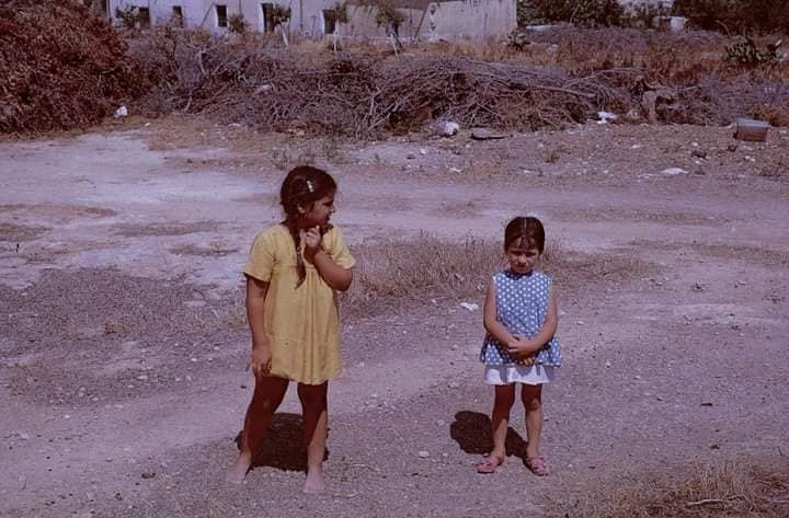 Girls in the aloni (where the grain was thrashed) in front of Yia Yia's house..jpg