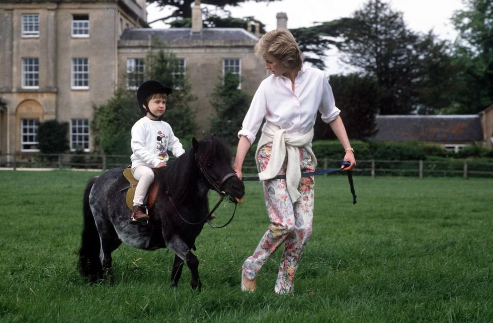 Helping Prince William ride his pony at Highgrove. 1986.jpg