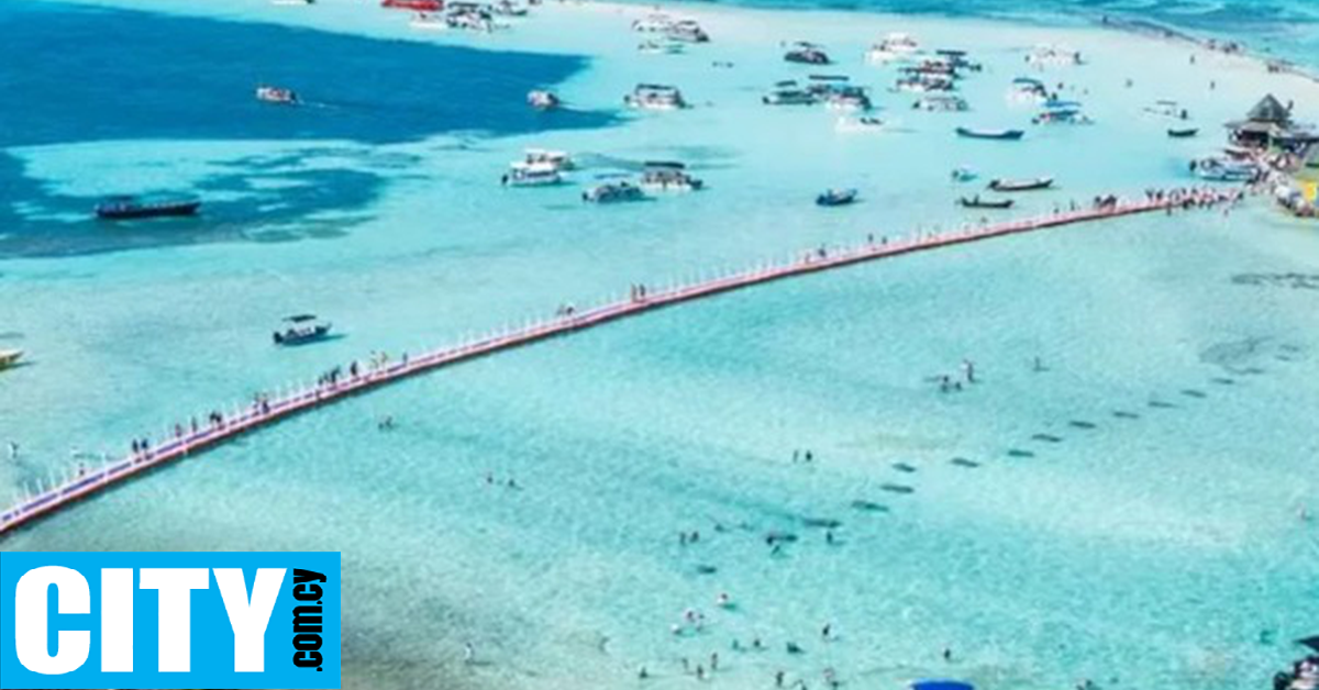 &Eta; &pi;&alpha;&rho;&alpha;&lambda;ί&alpha; &tau;&eta;&sigmaf; &Nu;ό&tau;&iota;&alpha;&sigmaf; &Alpha;&mu;&epsilon;&rho;&iota;&kappa;ή&sigmaf; &mu;&epsilon; &mu;&iota;&alpha; &theta;ά&lambda;&alpha;&sigma;&sigma;&alpha; &epsilon;&pi;&tau;ά &chi;&rho;&omega;&mu;ά&tau;&omega;&nu;