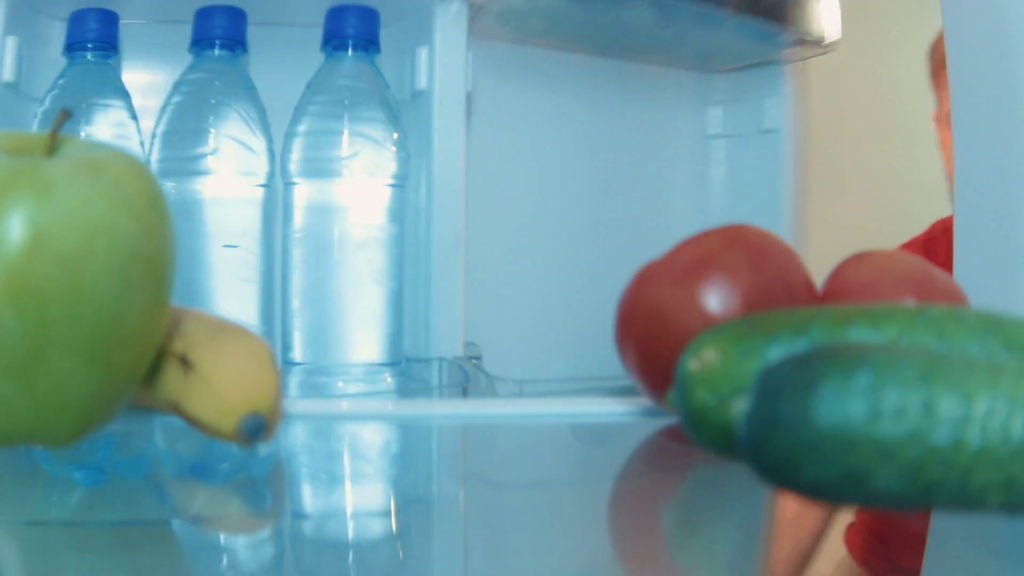 young-man-opens-the-fridge-takes-bottle-of-water-and-drinks_b6zyvya6_thumbnail-full01.png